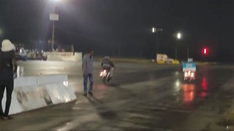Watch Two Motorbike Delivery Drivers Go Drag Racing