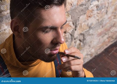 Youthful Rueful Male Holding Cigarette Stock Photo Image Of Noble