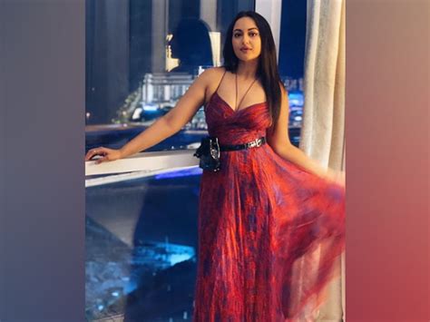 Bhuj Actress Sonakshi Sinha In A Pretty Red Printed Dress