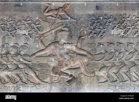 Sandstone Carvings In On The Walls Of Angkor Wat Near Siem Reap