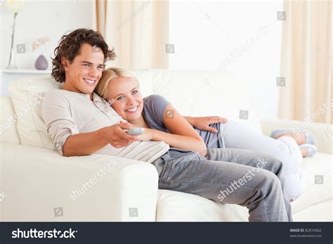 Couple Cuddling While Watching Tv Their Stock Photo 82814362 Shutterstock