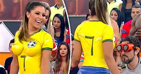 tv babe wears football kit on air but can you see what s wrong with it daily star