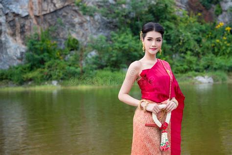 Beautiful Thai Girl Wearing Red Thai Traditional Dress In Loy Krathong