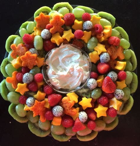 Edible fruit centers for beginners | my tricks to cut fruit easy by j. Christmas fruit platter tray | Holiday fruit, Christmas recipes appetizers, Christmas fruit