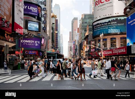 Busy Pedestrian Crossing In Times Square Manhattan New York Usa