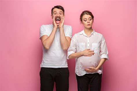 The Funny Surprised Handsome Man And His Beautiful Pregnant Wife`s