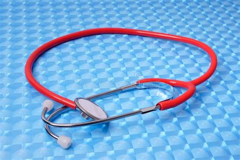 Red Stethoscope Close Up And Still Life Of A Modern Stethoscope For