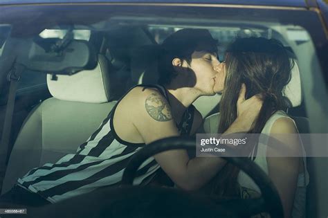 Couple Kissing Inside A Car Photo Getty Images