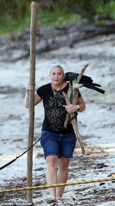 Epsteins Sex Slave Virginia Roberts Gathers Driftwood On A Beach In Australia Daily Mail Online