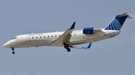 N431sw United Express Mitsubishi Crj 200 By Peter Cuthbert