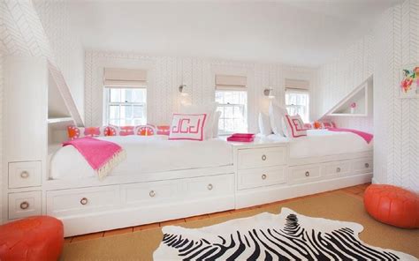 Shared White And Pink Girls Bedroom Boasts White Built In Twin Bunk