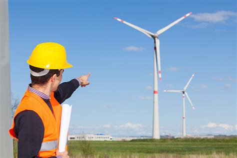 Engineer At Work In Wind Turbine Power Station Stock Photo Download