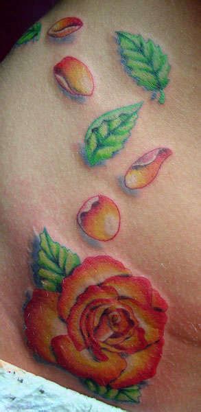 See which flower tattoo designs impress us as we showcase some amazing ink work! Rose and petals tattoo