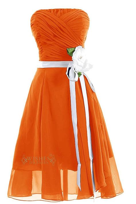 Orange Chiffon Strapless Gown With Ruched Bodice And Side Zipper Close Method While The Waist