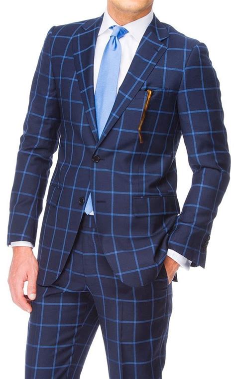 Notch lapels with pick stitching; Classic blue windowpane suit white shirt and light blue ...