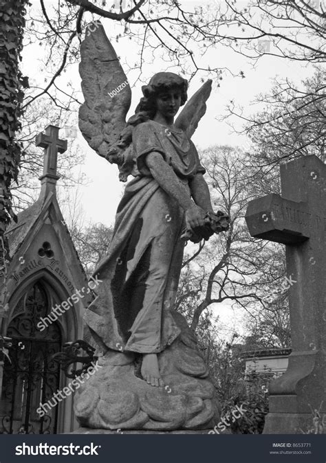 Angel Sculpture In Pere Lachaise Parisian Cemetery Stock Photo 8653771