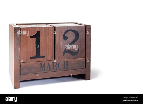 Wooden Perpetual Calendar Set To March 12th Stock Photo Alamy