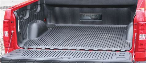 The Back End Of A Red Pick Up Truck With Its Cargo Compartment Open And