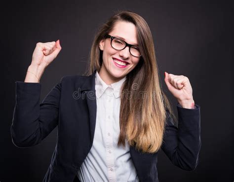 Successful Business Woman Celebrating With Fists Up Stock Photo Image