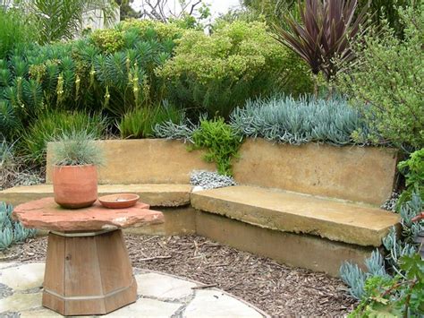 Playful design can create flat. Bench/Retaining Wall at Esteban Garden | Recycled concrete ...