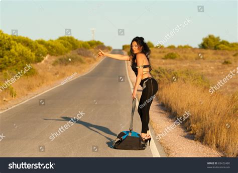 Sexy Hitchhiker Trying Her Luck On A Lonely Road Stock Photo Shutterstock