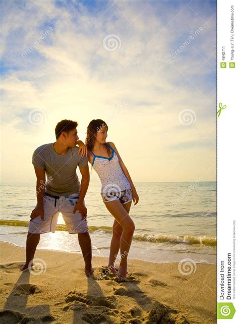 Romantic At Beach Asian Couple Standing By The Romantic Golden Sunset Beach Romantic Scenes