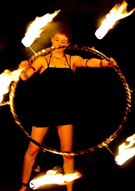 A Firespinner Twirls Around A Flaming Hoola Hoop At The La Flickr
