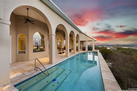 A San Antonio home for sale has windows offering panoramic Hill Country