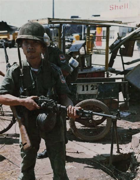An Arvn Abn Soldier Holds A Chicom Machine Gun Captured By Flickr