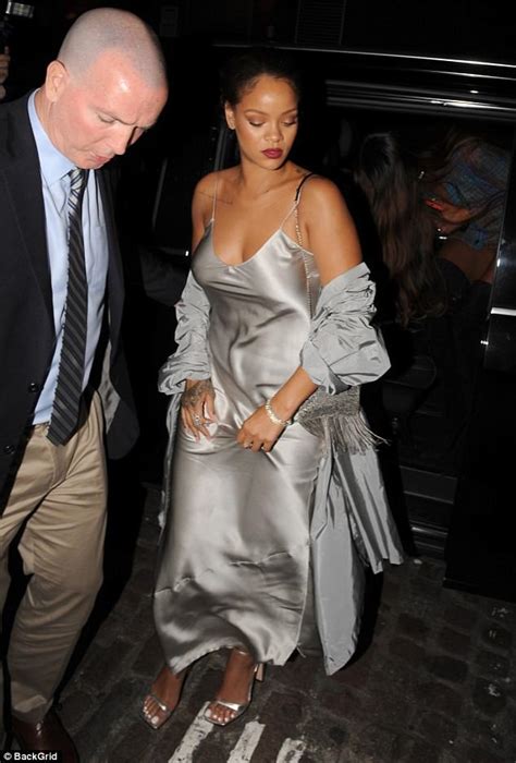 Braless Rihanna Shows Off Her Curves In Silver Satin Dress Daily Mail