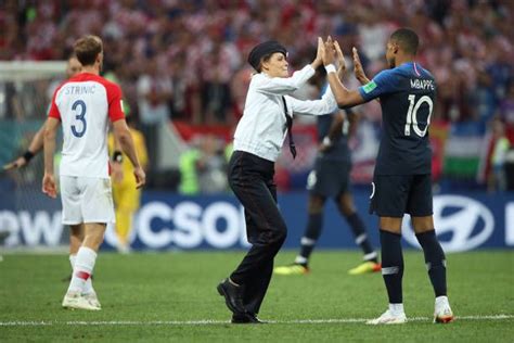 Kick off at 19:00 (gmt) on 28th june, 2021. Pitch invader high five's Kylian Mbappe of France during ...