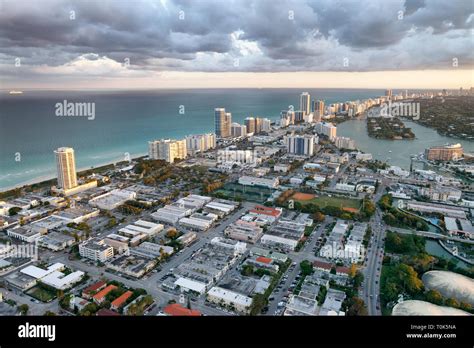Aerial View Of Miami Beach At Sunset From Helicopter City Skyline And