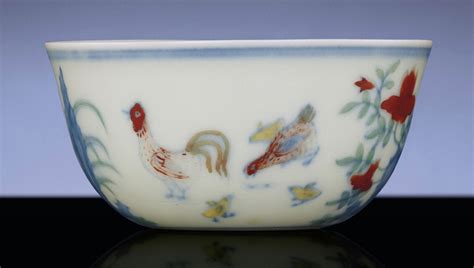 A RARE MING-STYLE DOUCAI 'CHICKEN' CUP | QING DYNASTY, 18TH CENTURY