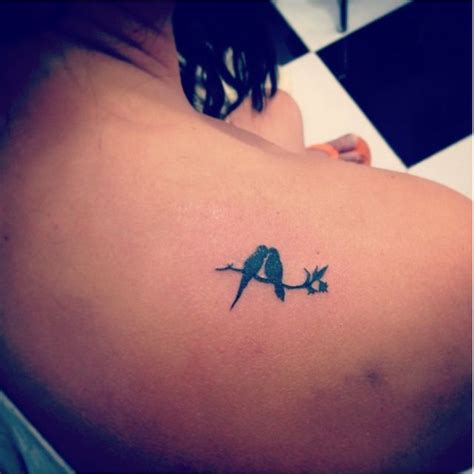 The other bird design is much smaller in front of a red sun. 15 Tiny Tattoo Ideas for Your First Tattoo Designs ...