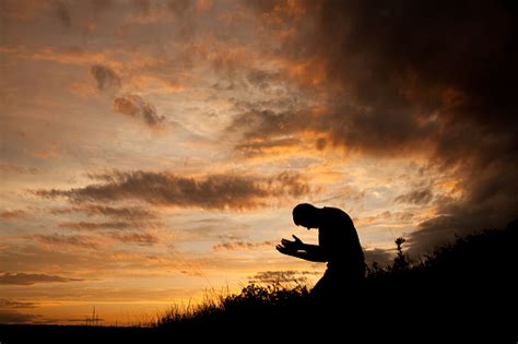 Man Praying Stock Photo Download Image Now Istock