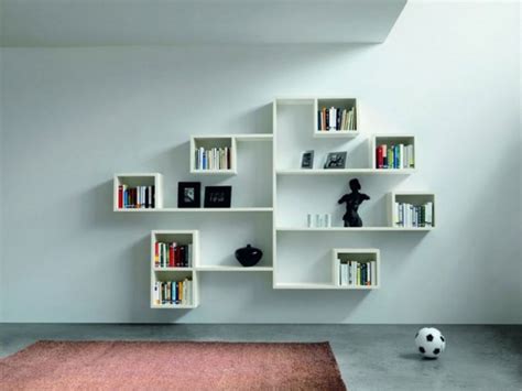 It is where family and friends alike gather to share stories, watch movies, read, and unwind. 15 Fabulous Minimalist Shelves For Your Living Room In ...