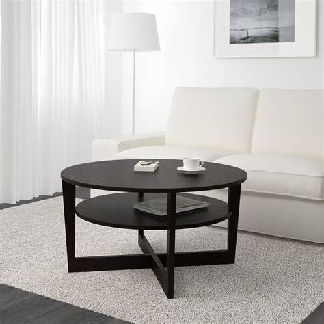 This is not a stool, and neither is it a table that one can incessantly lug from one place to another. VEJMON Coffee table - black-brown - IKEA