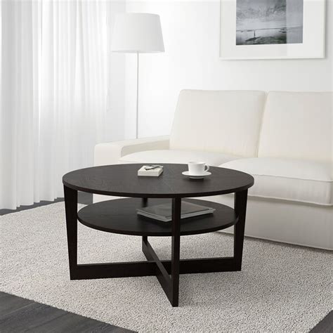 Helps you keep your things organized and the table top clear. VEJMON Coffee table - black-brown - IKEA