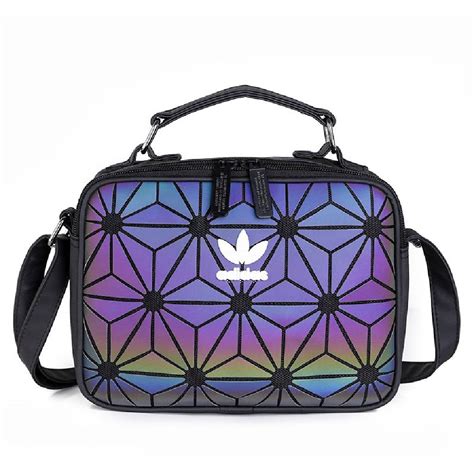 The bag is created of 100 percent polyester. Adidas women sling bag - Claz.org