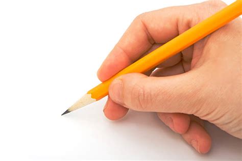 Royalty Free Hand Holding Pencil Pictures Images And Stock Photos Istock