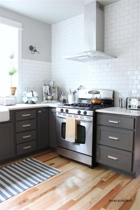 We have updated our kitchen and you can see the full diy kitchen makeover reveal now! Charcoal kitchen cabinets photos