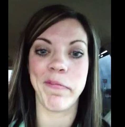woman laughing at her numb face is hysterical
