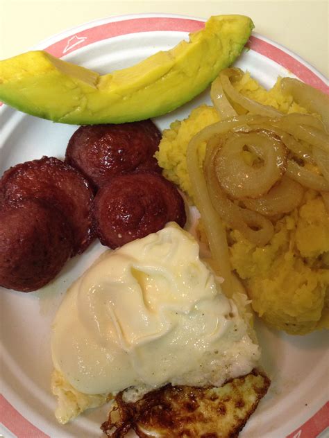 A Traditional Dominican Breakfast Mangu Con Los Tres Golpes And Avocado On The Side Delish