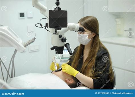 Dental Clinic Latest Equipment And Technology Female Doctor Treats
