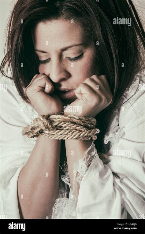 Women Hands Tied Rope Hi Res Stock Photography And Images Alamy