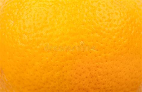 Macro Shot Of Orange Skin Texture Full Frame Of An Unpeeled Orange