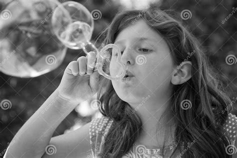 Young Girl Blowing Bubbles Stock Image Image Of Female 85583667