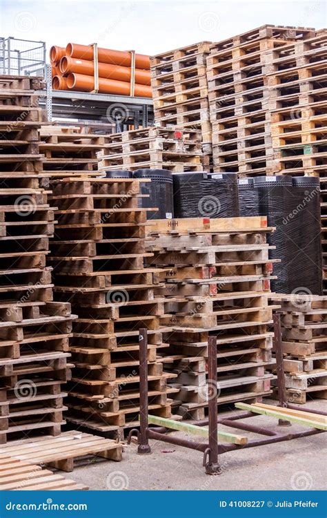 Stacks Of Old Wooden Pallets In A Yard Stock Image Image Of Haulage