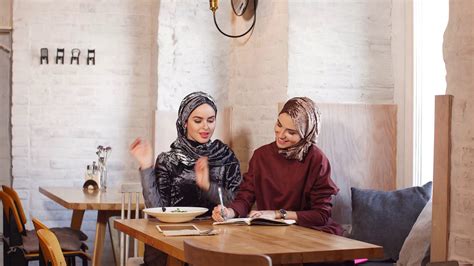 Two Women Wearing Hijab In Cafe Having Stock Footage Sbv 321972067 Storyblocks
