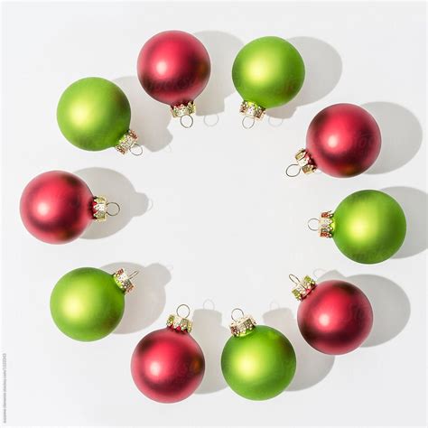 Festive Red And Green Glass Christmas Ornaments By Stocksy